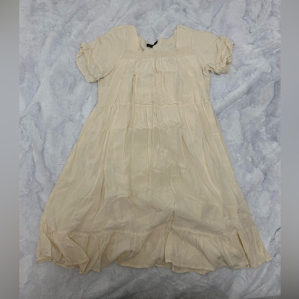 Women’s cream colored dress